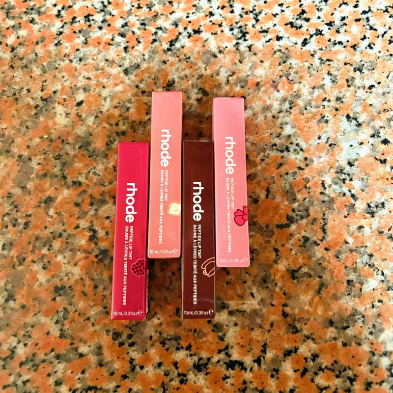New Version of Rhode Hailey Tinted Lip Gloss Liquid Lip Gloss Water-Glossy Lip Glaze Lip Plumping Oil Moisturizing Lip Balm Cross-Border New Version of Rhode Hailey Tinted Lip Gloss Liquid Lip Gloss Water-Glossy Lip Glaze Lip Plumping Oil Moisturizing Lip Balm Cross-Border