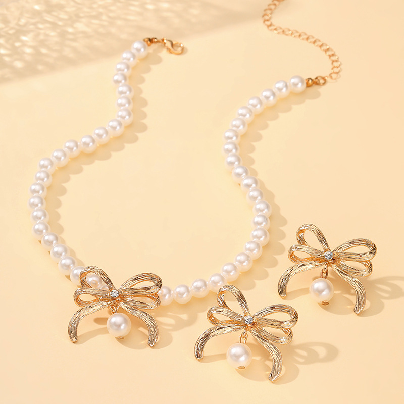 Joyas transfronterizas europeas y americanas moda imitación de perlas collar conjunto de aleación de estilo de lujo ligero lazo cadena de clavícula image 4
