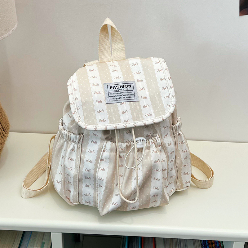 2026 nueva mochila de alta capacidad de moda simple mochila de estudiantes de secundaria a rayas de color contrastante popular dulce hombro