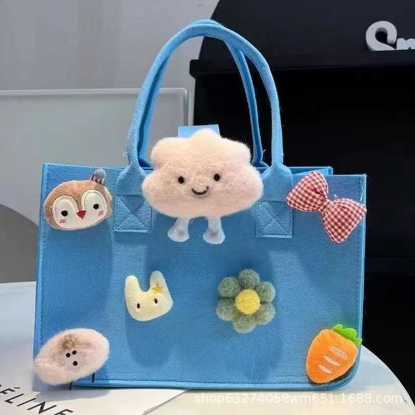 Fabricantes al por mayor en línea sobre rojo bolso de fieltro bolso de mano regalo de dibujos animados bolso de fieltro promoción de apertura bolso de regalo almacenamiento
