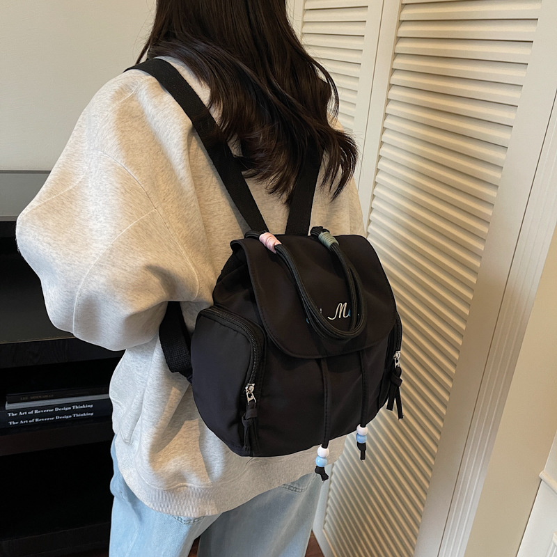 2025 moda moda moda personalidad mochila de textura casual simple nicho diseño de mochila de mujer de textura