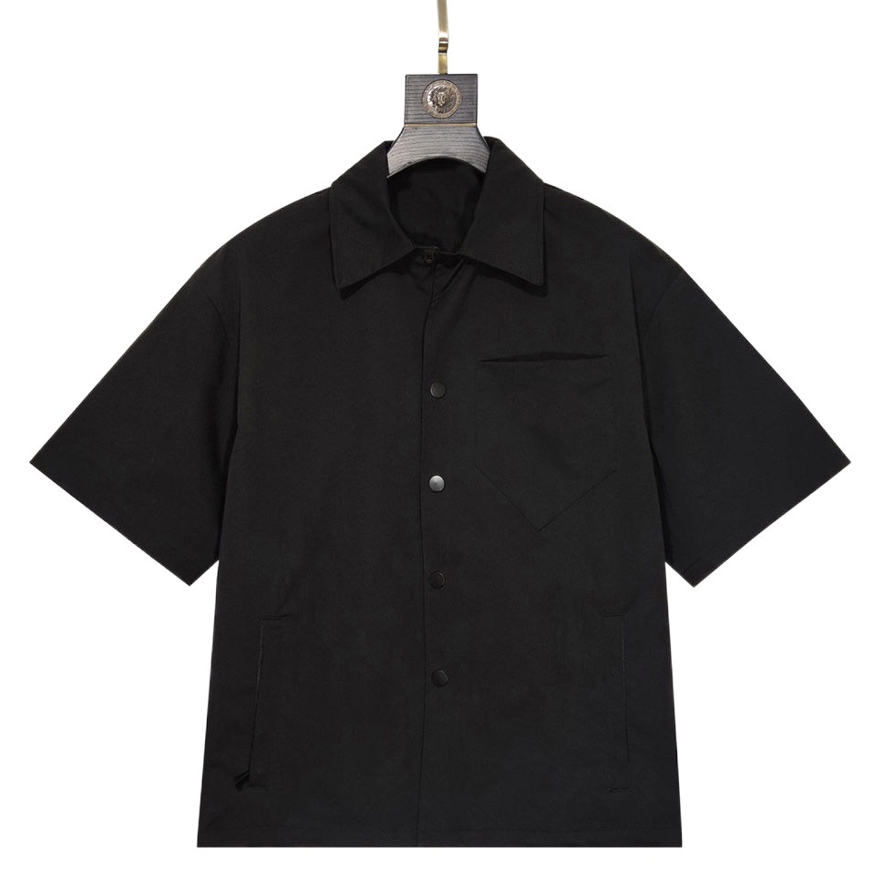 23 años camisa de manga corta clásica europea y americana solapa de verano de los hombres Polo suelta invertida triángulo bordado Diseño superior