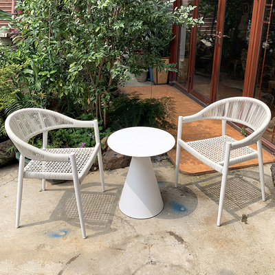 Mesa y silla al aire libre de tela de caña combinación de patio de hotel terraza jardín balcón café tela de caña mesa y silla de lujo al aire libre