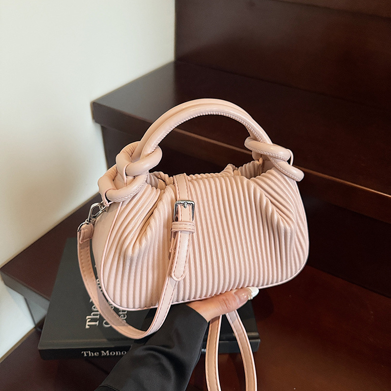 Versión coreana del bolso de nicho 2025 verano nuevo bolso femenino bolso de hombro fresco simple bolso de mensajero a rayas de moda