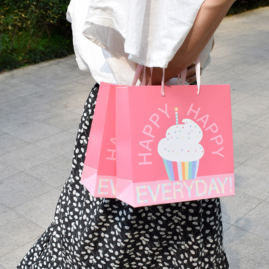 女装服装店加厚白卡印卡通可爱粉色手提袋现货女生生日回礼包装袋