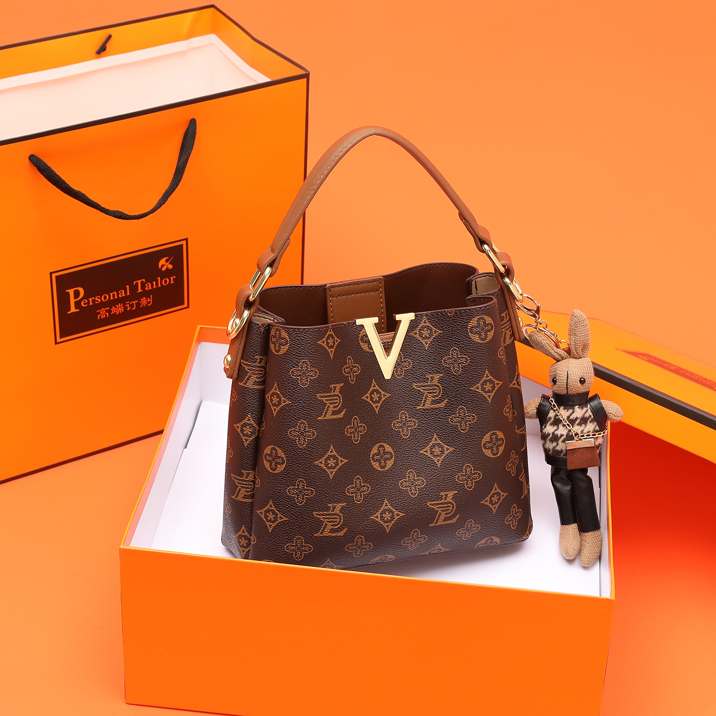 单肩包女真皮水桶包花纹复古时尚手提包气质斜挎包网红洋气女包潮