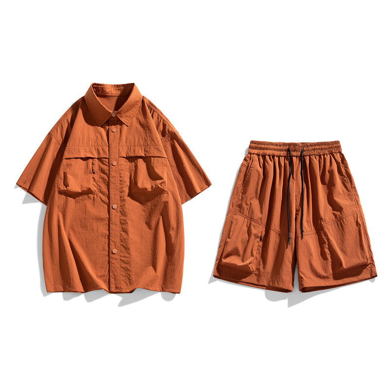 Trajes deportivos de moda masculinos de moda dos pantalones cortos de mangas cortas de verano sueltos y frescos al por mayor