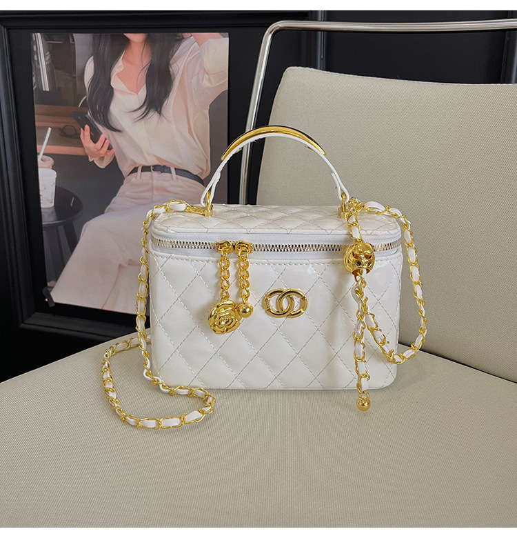 Bolso de mujer caja de mano de verano bolso pequeño 2026 nuevo estilo de alto nivel sensación pequeña fragancia estilo diamante cadena mochila
