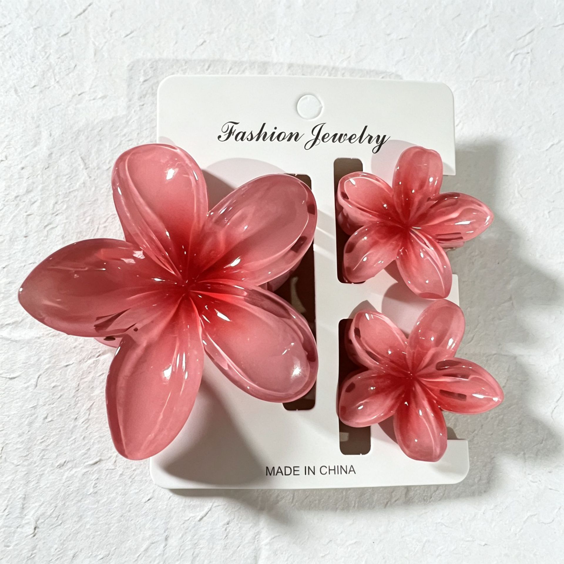 Ventas transfronterizas calientes nuevos huevos láser de dos colores clip de agarramiento de flores de cabeza posterior clip de tiburón clip de cabello joyerías para el cabello