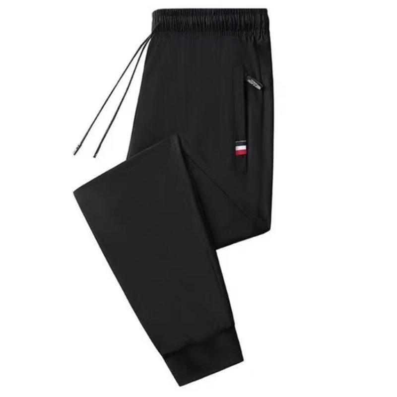 Nuevo estilo coreano más tamaño forrado de lana gruesa cremallera amarilla Pantalones deportivos para hombres Pantalones casuales atados al tobillo de los hombres 2023 Otoño e Invierno