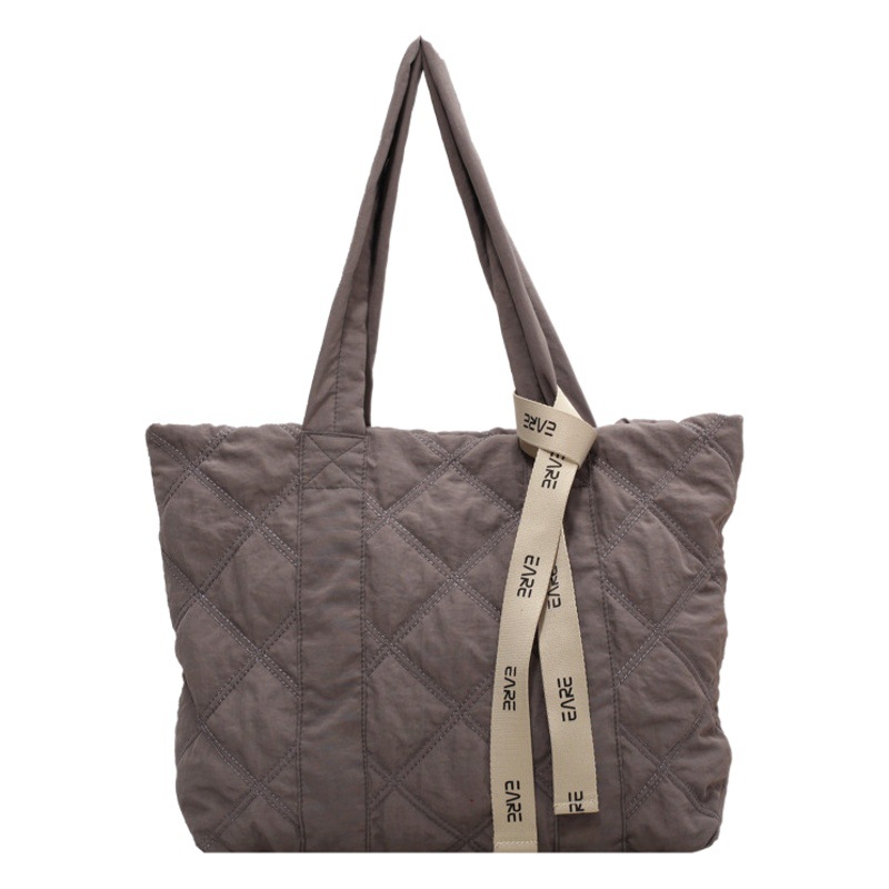 Fábrica de gran capacidad bolso de mano femenino estudiante universitario Clase de cercanías bolso de hombro simple moda todo partido bolso de mano al por mayor