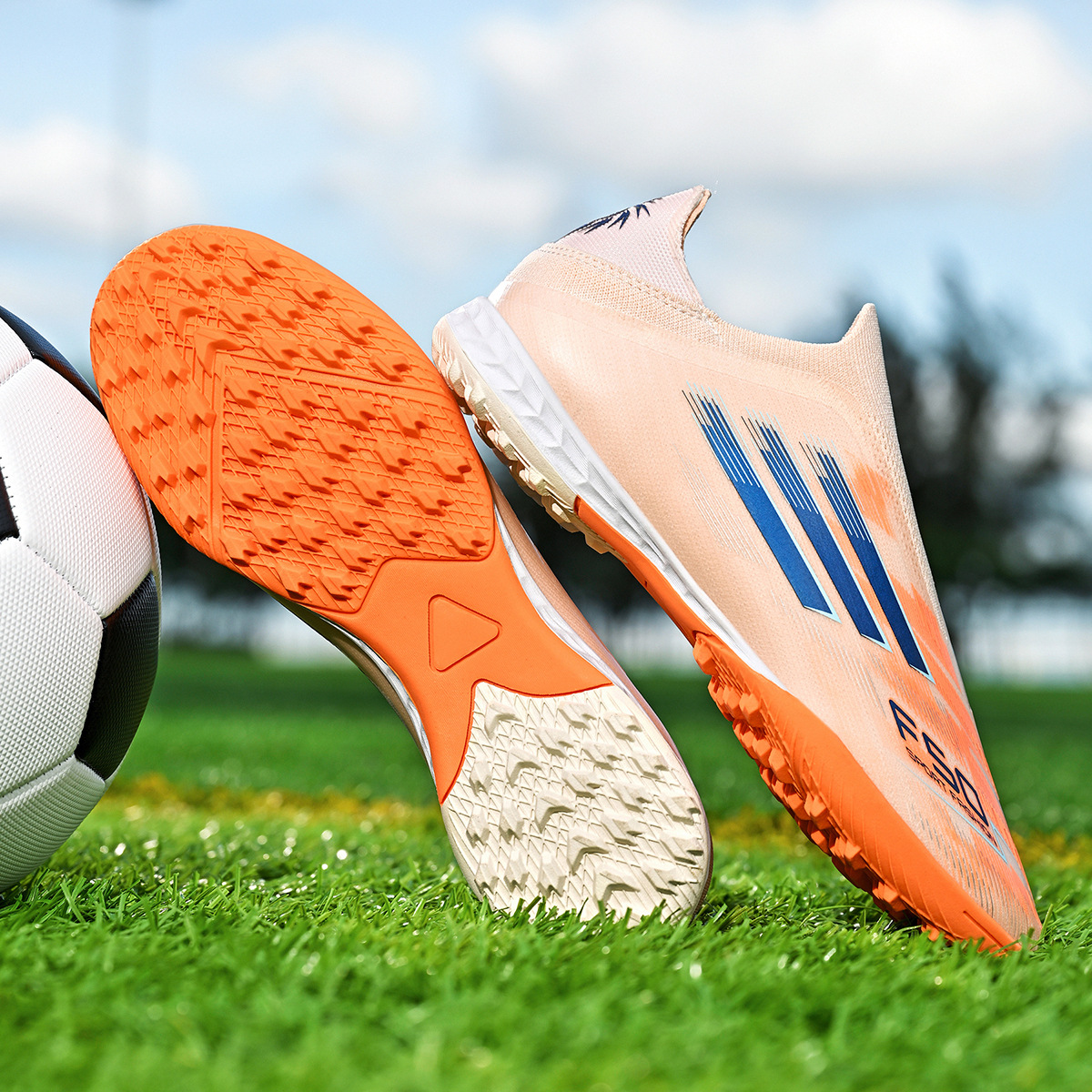 Zapatos de fútbol infantiles transfronterizos, zapatos de fútbol adolescentes masculinos, estudiantes, zapatos de fútbol femeninos TF, zapatos de fútbol aggravar al por mayor image 2