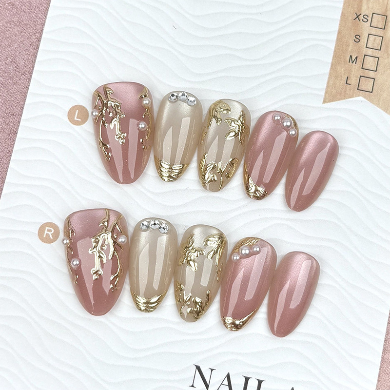 Cross-border translucent nude pink cat-eye press-on nails with gold-plated pearls and almond shape, light luxury detachable handmade nail pieces wholesale Cross-border translucent nude pink cat-eye press-on nails with gold-plated pearls and almond shape, light luxury detachable handmade nail pieces wholesale