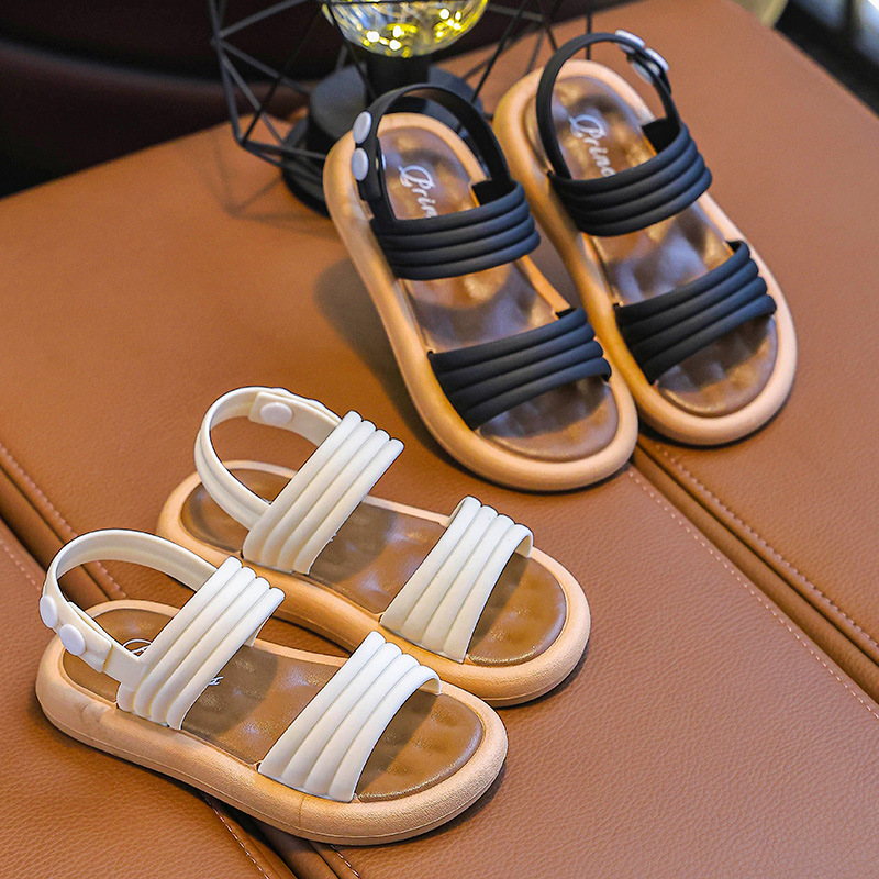 Niños sandalias de niñas de verano nuevo estilo de moda princesa coreana estudiantes lindas sandalias de aire exterior versátiles