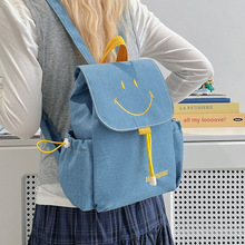 初秋新款高颜值多巴胺笑脸图案背包女轻便通勤百搭大容量双肩包