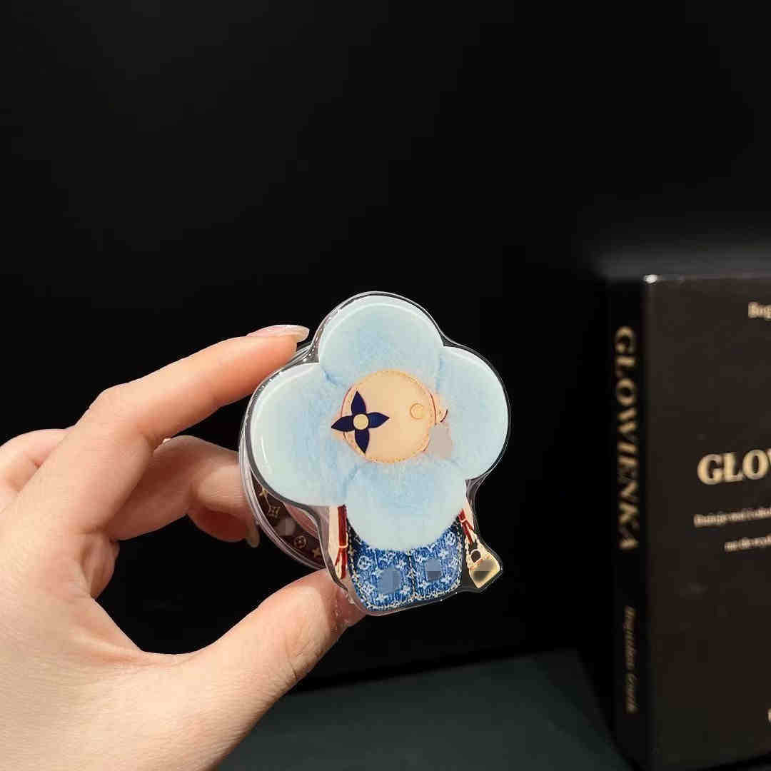 新型高級マグネットスタンドマグネット式携帯ケース通用太陽花マグネット式エアバッグスタンドはおしゃれで豪華です。