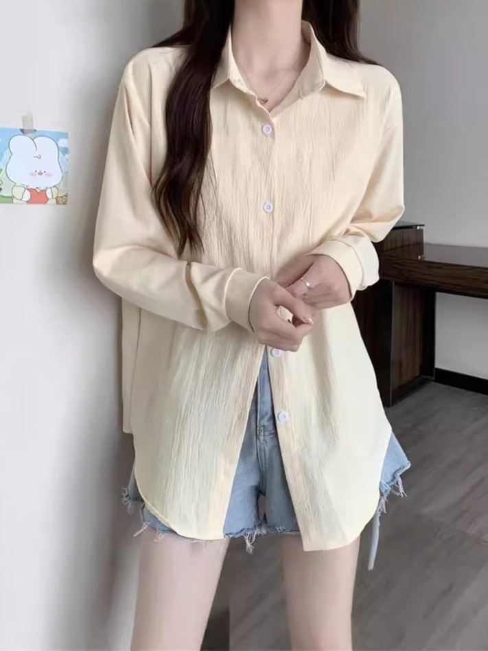 폴로 칼라 긴 소매 셔츠 여성의 2024 년 봄과 가을 새로운 디자인 감각 틈새 단색 긴 느슨한 탑 여성