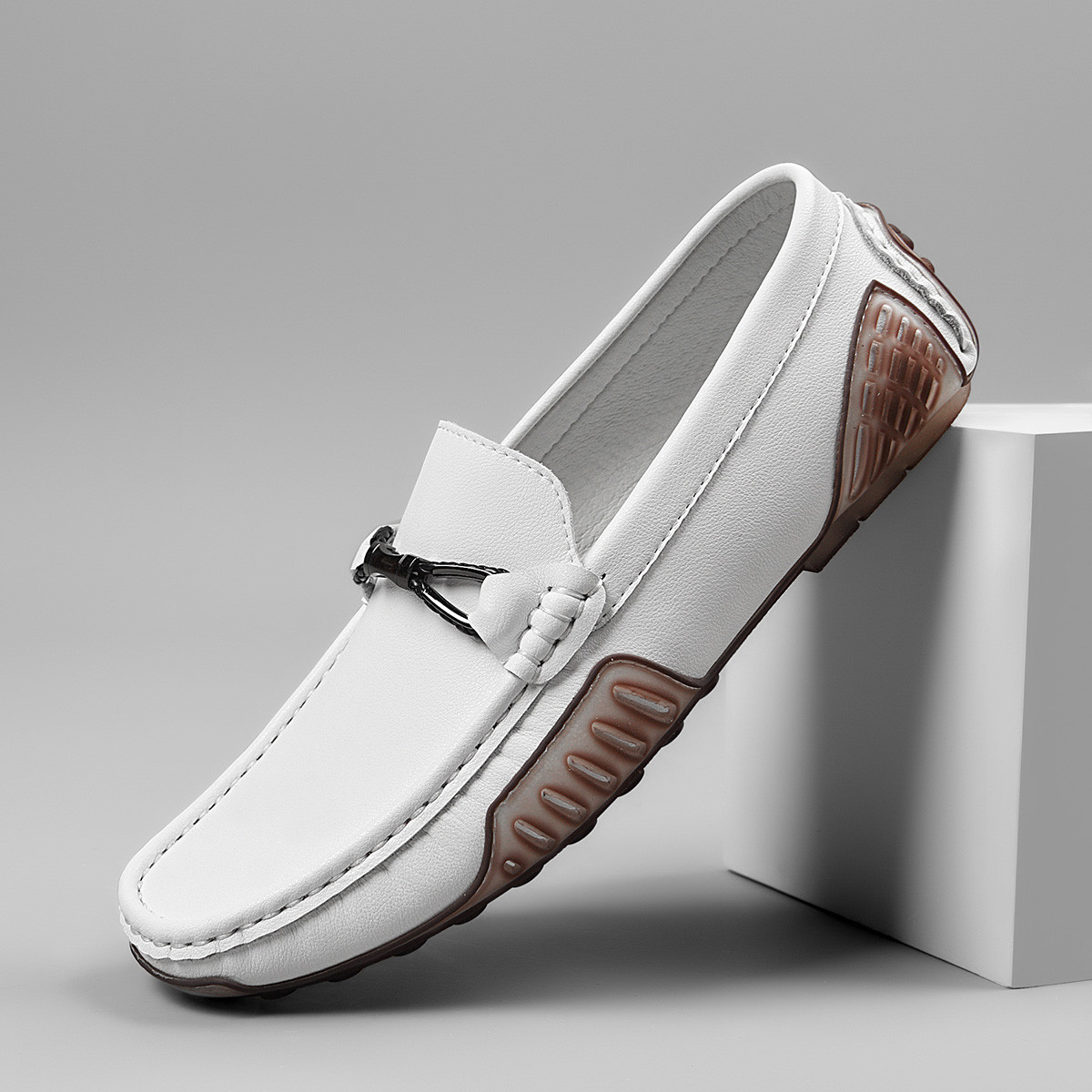 Zapatos de cuero verdaderos de primavera y verano transpirables, zapatos de cuero casuales, zapatos de conducción grandes para hombres.