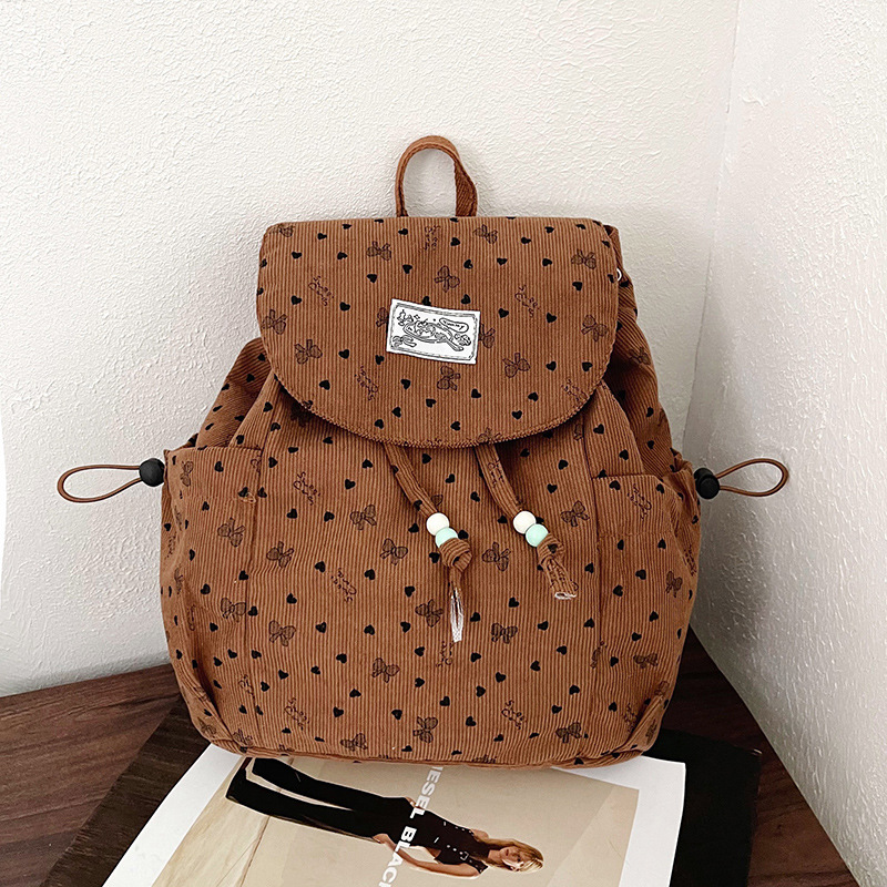 2026 mochila de viajes escolares de gran capacidad para mujeres coreanas frescas pequeñas ondas de diseño de moda mochila de moda mochila de moda