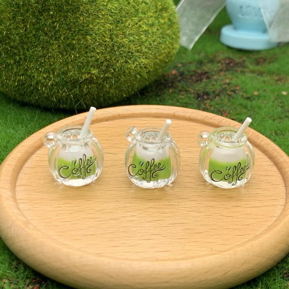 Suministro directo de fábrica de dos colores taza de café luminosa DIY accesorios para el cabello llavero mochila colgante material al por mayor diadema hecha a mano