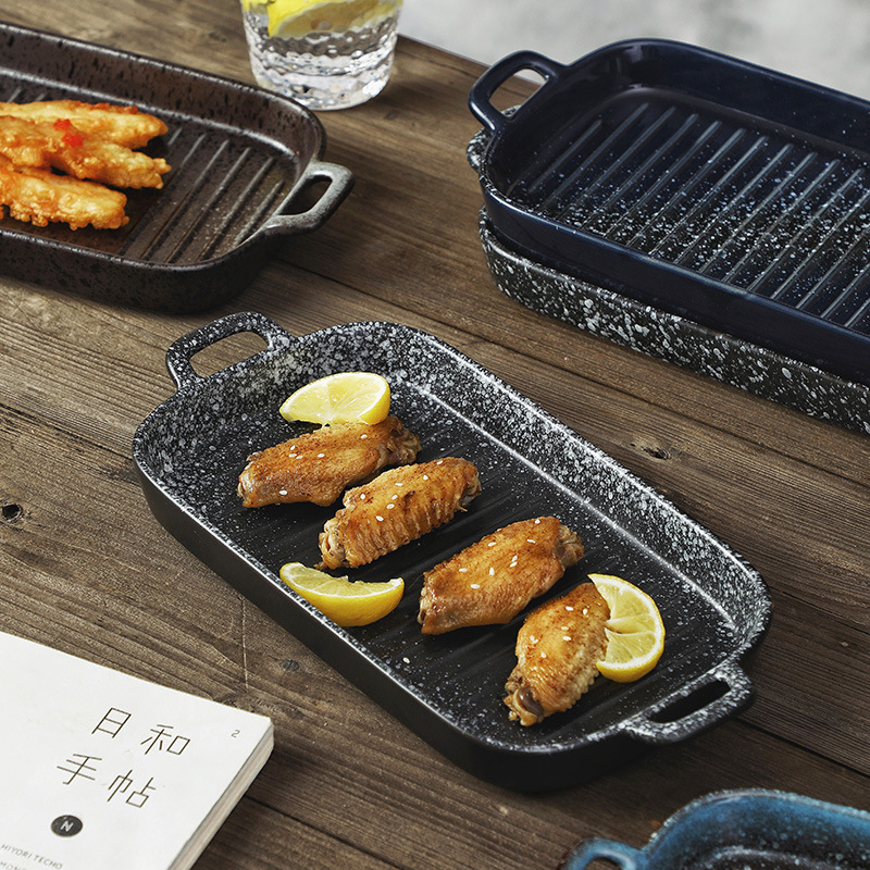 Japanese-style ceramic rectangular serving dish with two handles, suitable for steaming fish, baking, and use in ovens and microwaves; wholesale