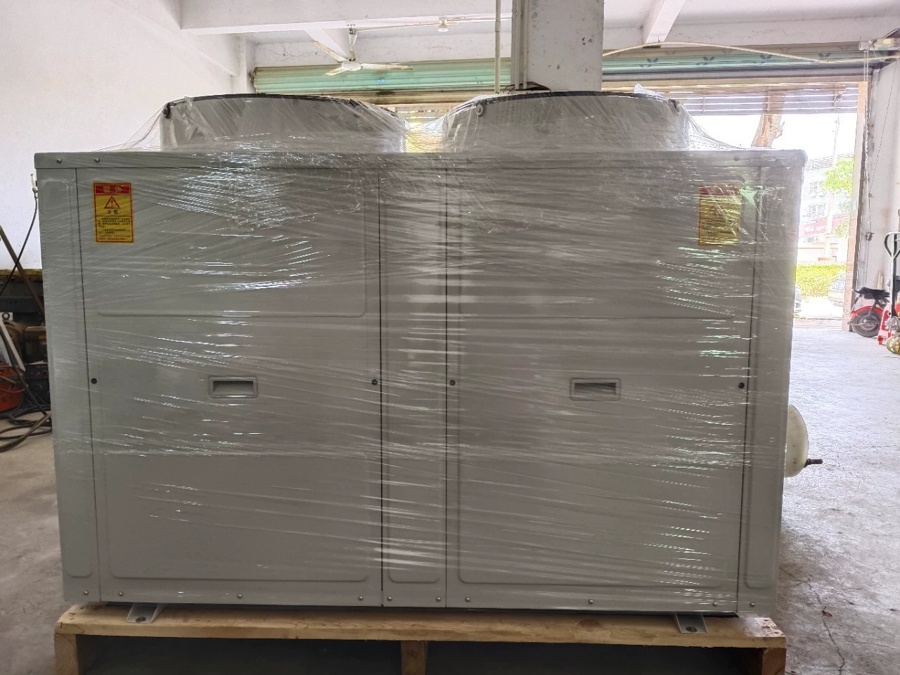 Производитель поставляет крупномасштабные высокоэффективные холодильные установки с воздушным тепловым насосом для сохранения свежести, заморозки и охлаждения для коммерческого использования.