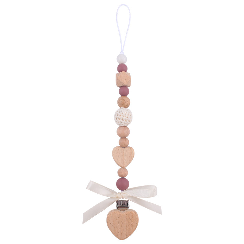 Nuevo bebé de dibujos animados hechos a mano arco chupete cadena creativa DIY bebé silicona teether pulsera juguete