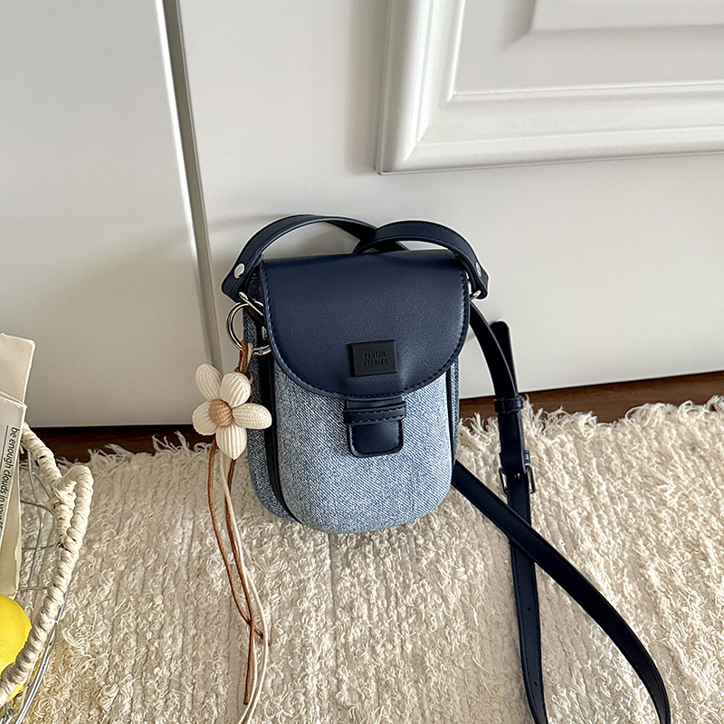 Bagos de silla de nicho de alta calidad para mujeres 2026 nuevo bolso de teléfono móvil ligero de lujo extranjero mini viaje mochila de hombro