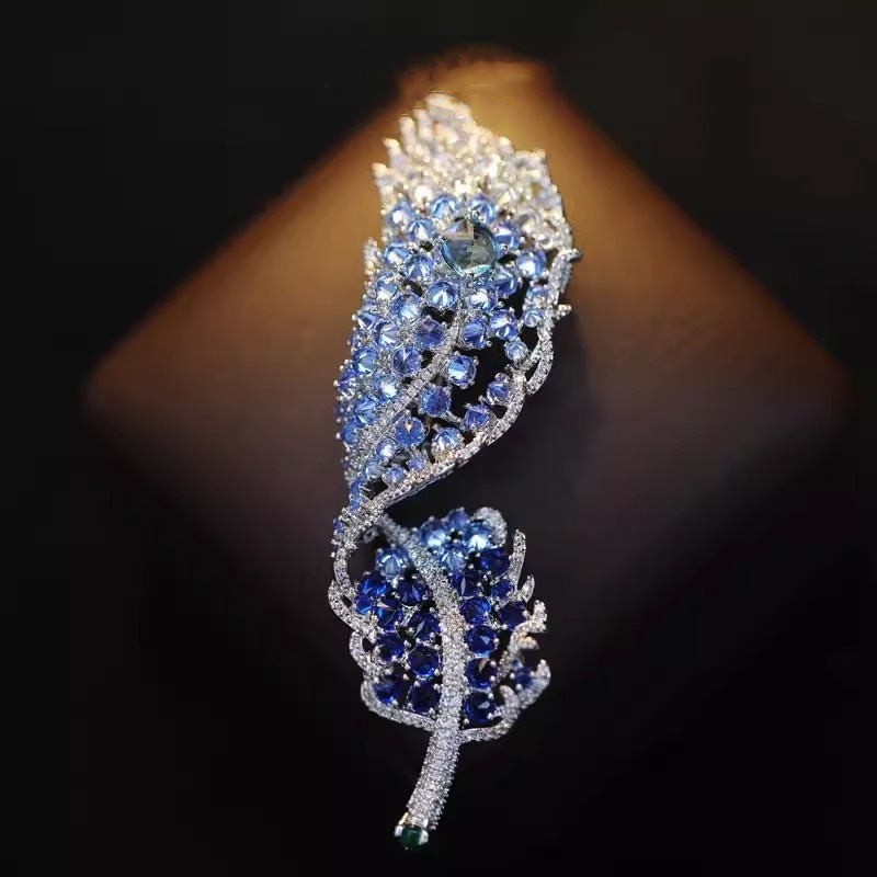 Spilla in piuma di lusso per donna elegante accessorio per cappotti_voghion.com