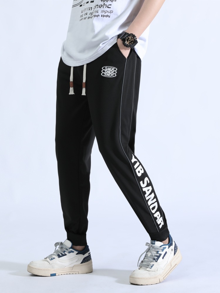 Pantalones deportivos para hombres primavera y otoño tendencia juvenil guapo ocio versátil cintura elástica transpirable pie pantalones largos