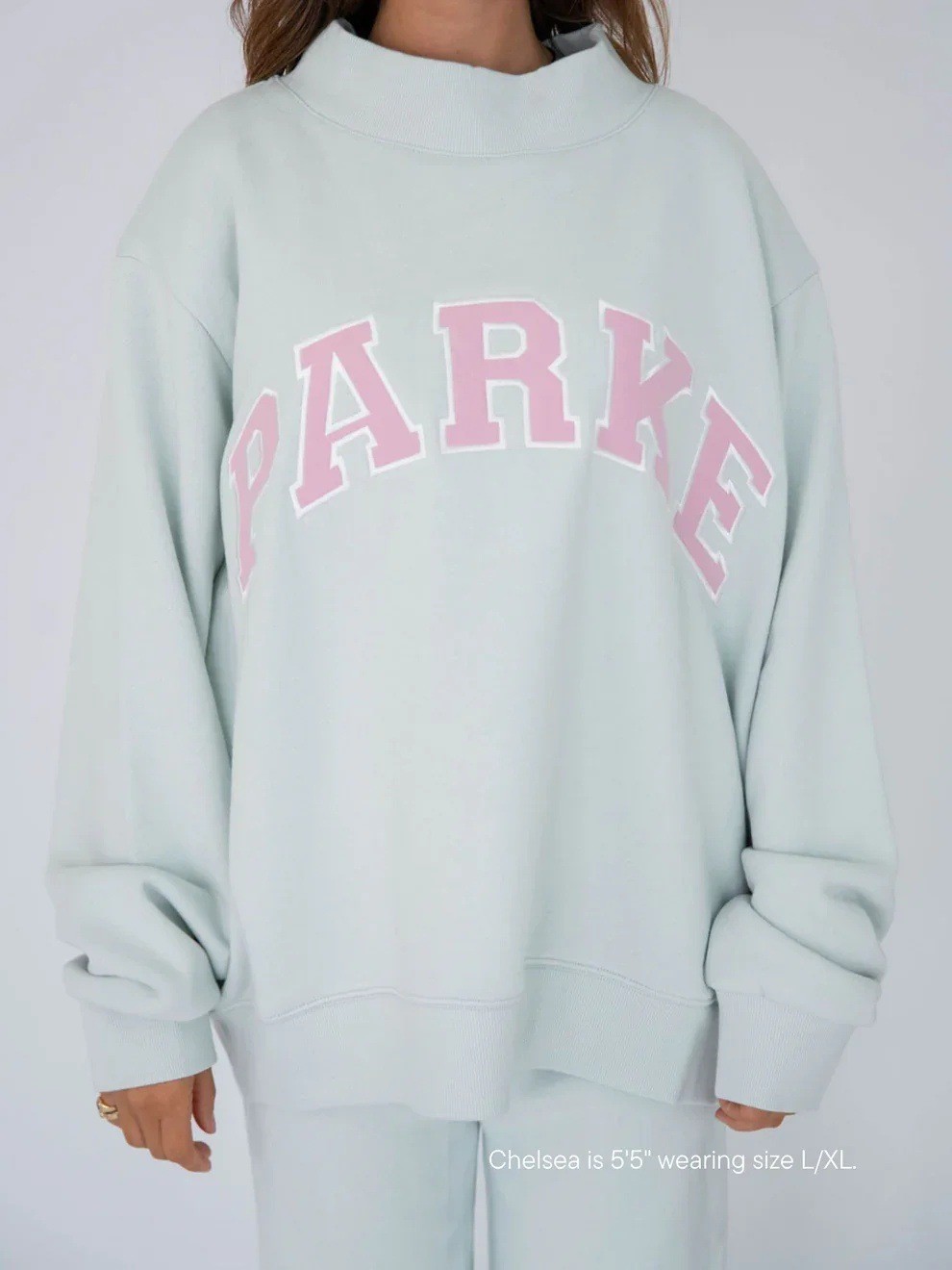 Light blue embroidered with pink background and white edge