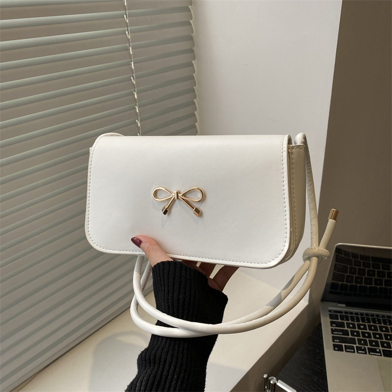 2025 verano nuevo estilo nicho bolso de axila moda femenina bolso cuadrado pequeño portátil ins bolso de hombro de estilo occidental