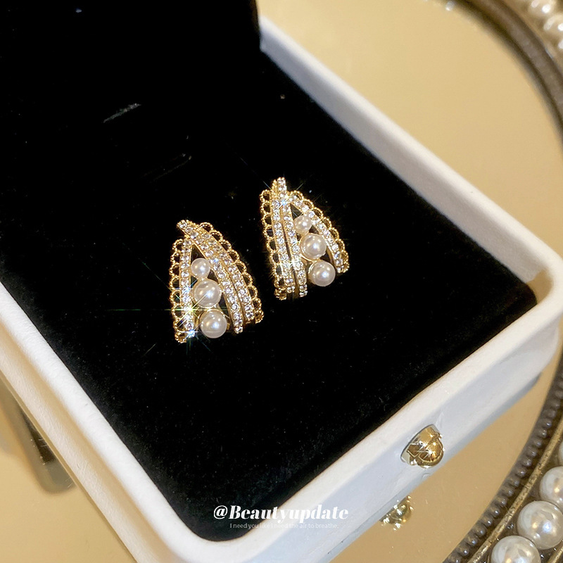 Pendientes de encaje de circonita de aguja de plata Pendientes de moda de estilo de lujo ligero francés Pendientes de todo fósforo de alta gama de celebridades de Internet al por mayor