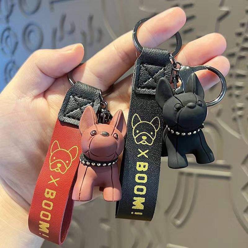 Creativo, colorido, violento, muñeca de oso de dragón, método de lucha de perros, llavero de muñeca de moda, llavero de personalidad de coche