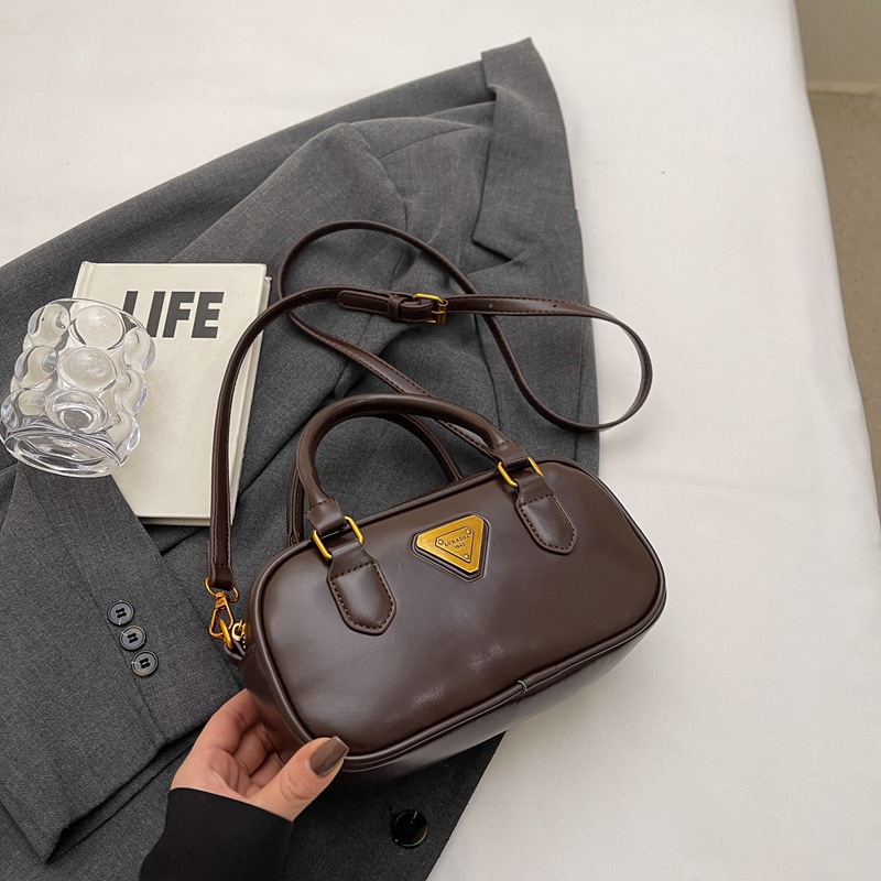 Bolso retro de bolos de mano para mujer 2024 nuevo bolso de hombro de diseño de cercanías de todo fósforo