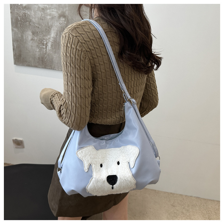 The new autumn and winter 2024 fashion cartoon backpack with simple, individual and niche design, single-shoulder bag and commuter tote bag undefined