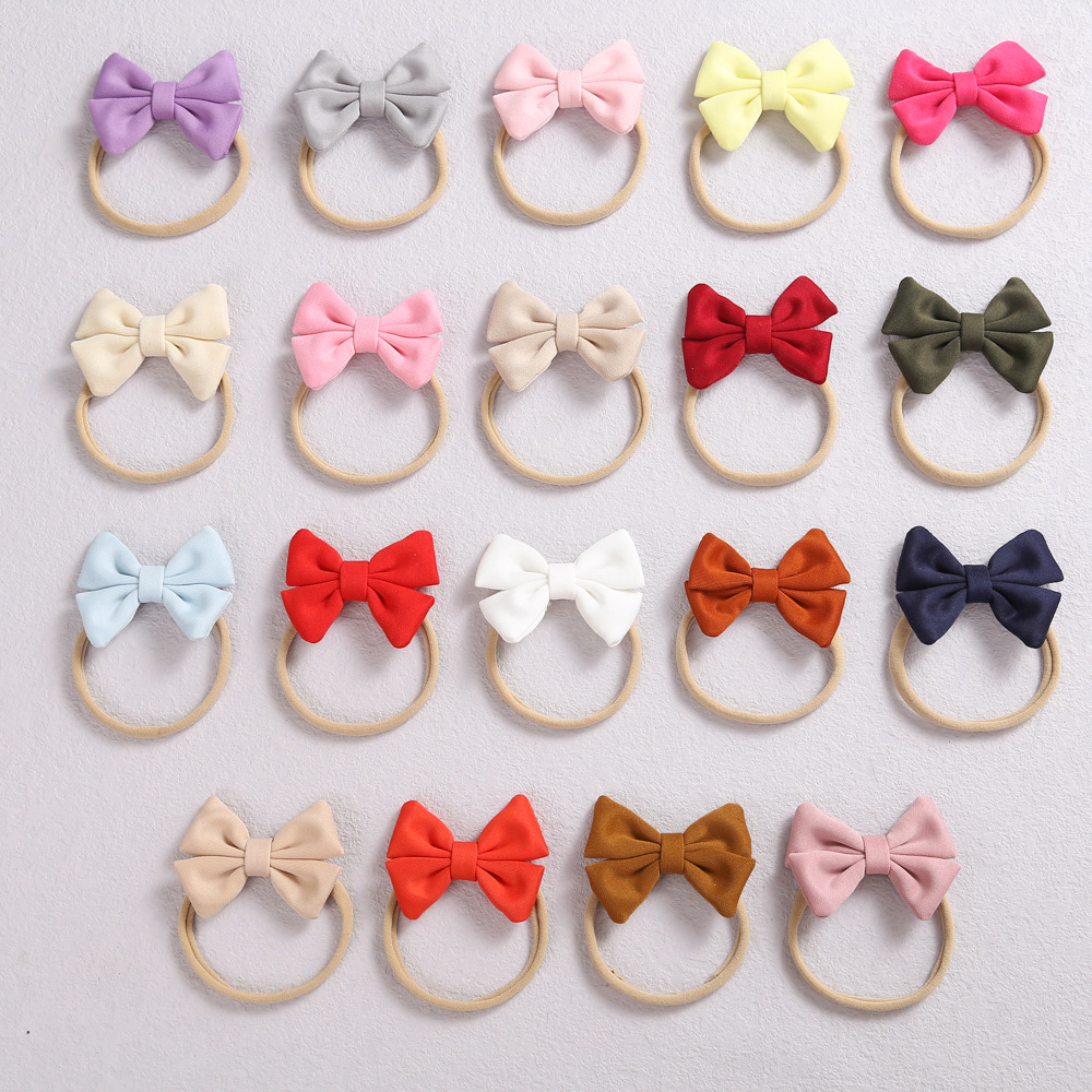 Comércio exterior malha confortável algodão artesanal bolsa cintura arco cocar europeu e americano cor de pele macio náilon elástico bebê cabeça anel_voghion.com