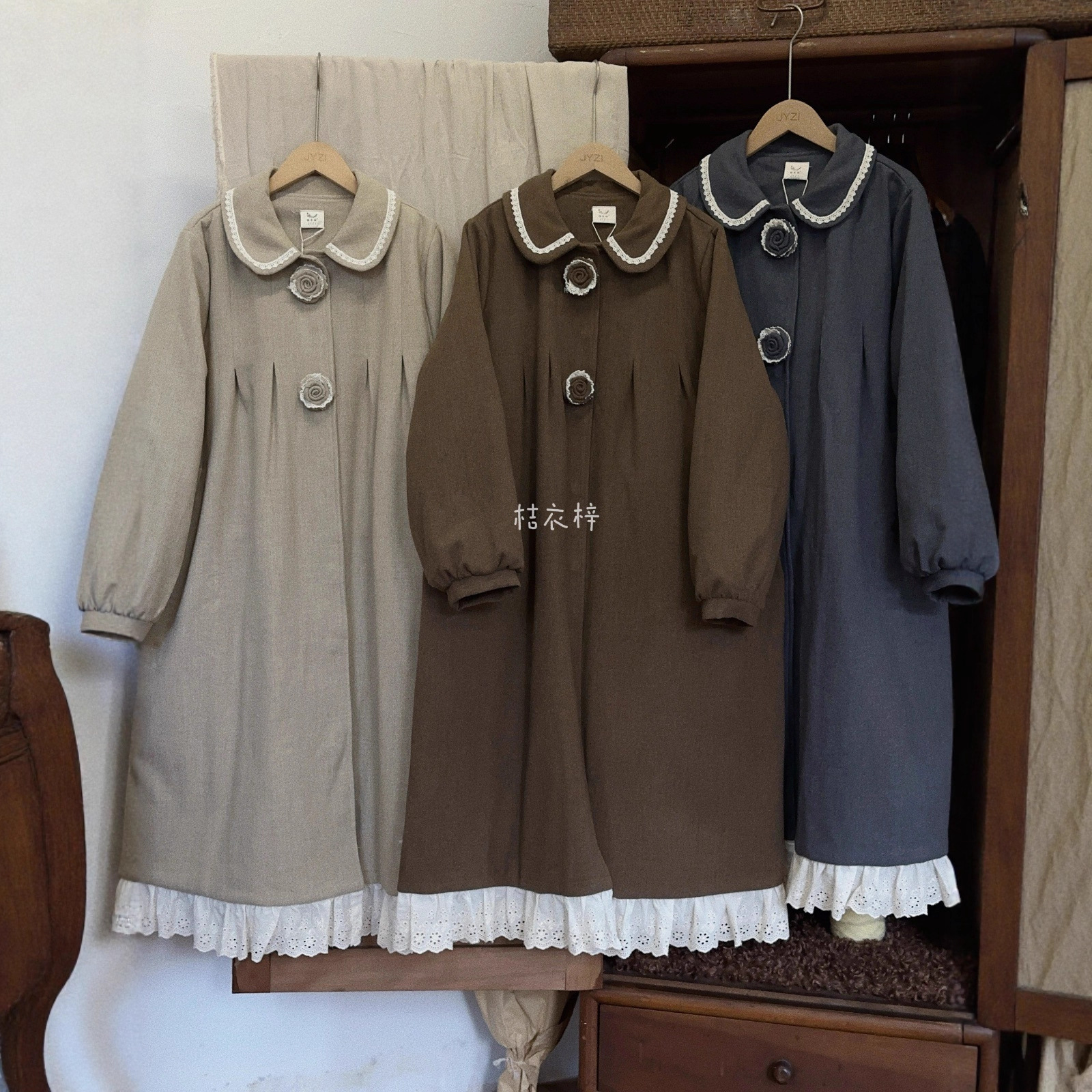 娃娃领玫瑰花蕾丝下摆拼接毛呢外套女文艺宽松显瘦中长款呢子大衣