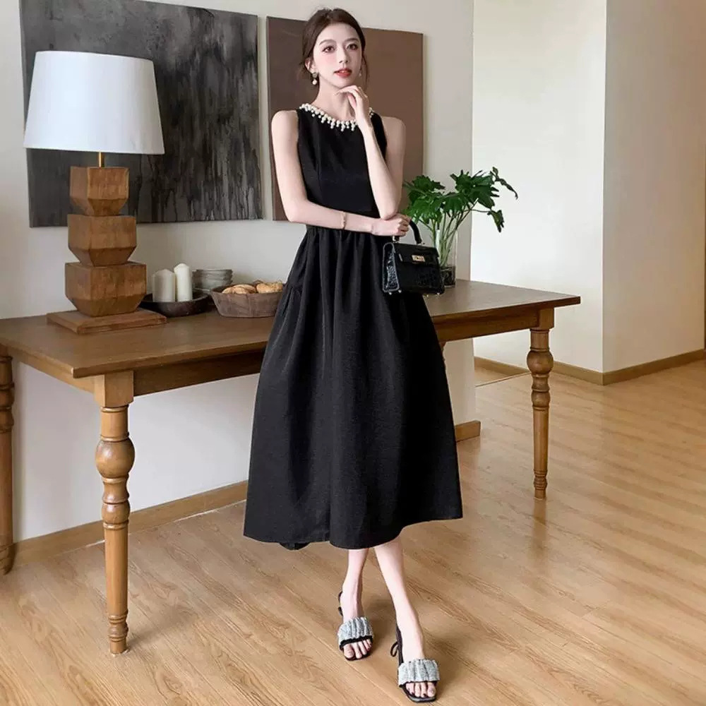 Europa estación chaleco negro vestido de mujer verano lujoso ligero Hepburn vestido de noche con perlas de estilo de alto rendimiento vestido largo