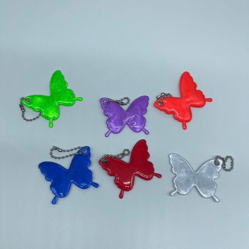 厳選されたクロスボーダー STOP バタフライ反射ペンダント PVC ナイトキーホルダーバックパックペンダント|undefined