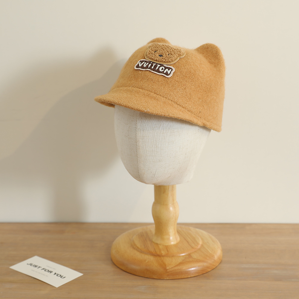 La nueva gorra de orejas de oso lindo y súper lindo niño coreano bebé masculino y femenino otoño e invierno cálido sombrero de copa de lana
