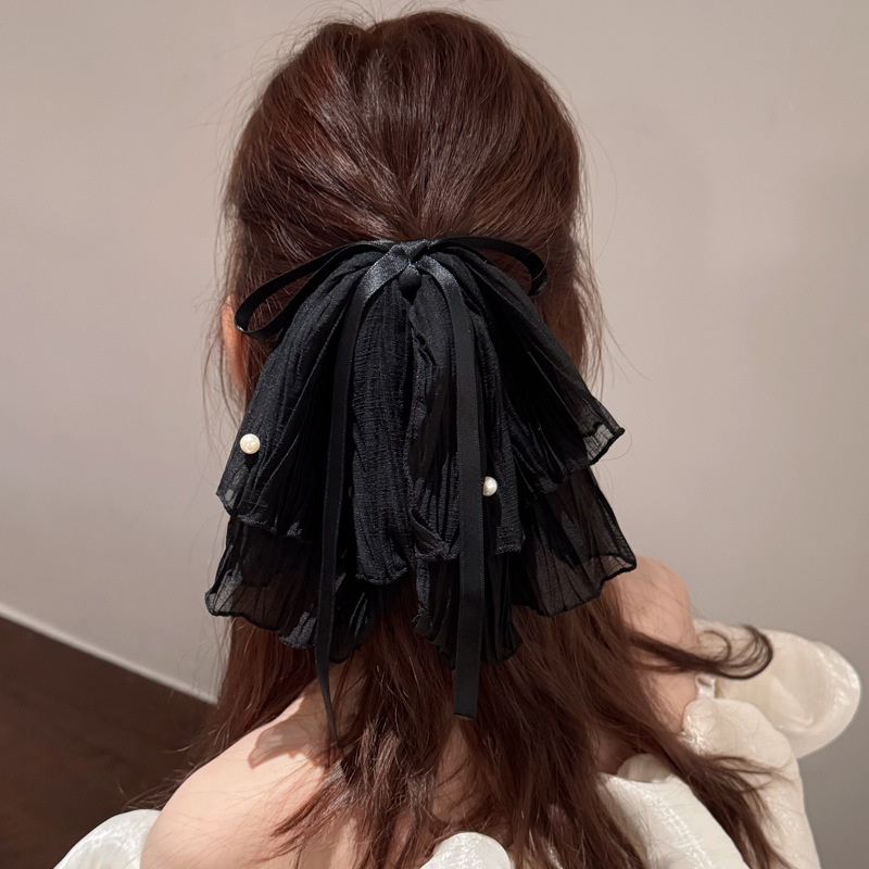 Черный хвостик с бантиком