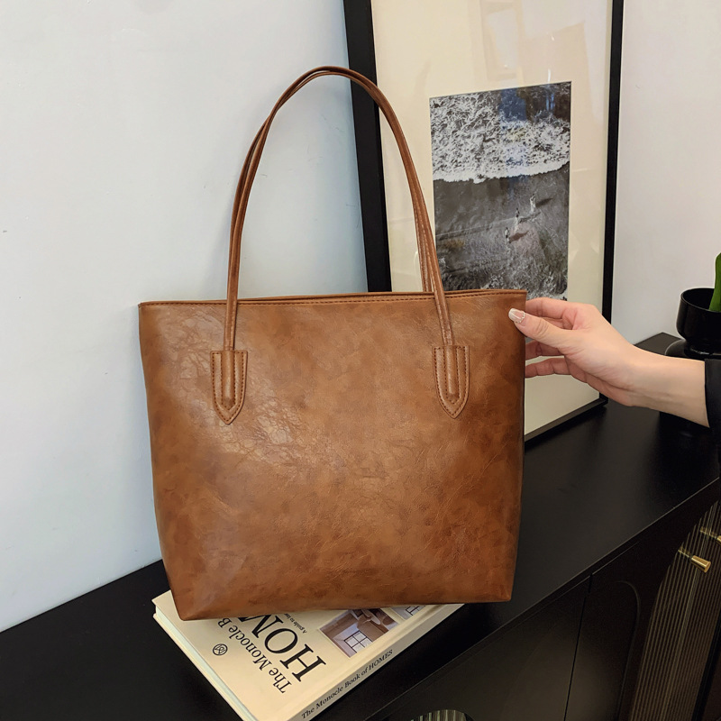 Bolso retro de gran capacidad para mujeres 2024 nueva moda coreana nicho bolso especial universal simple bolso axilar de hombro