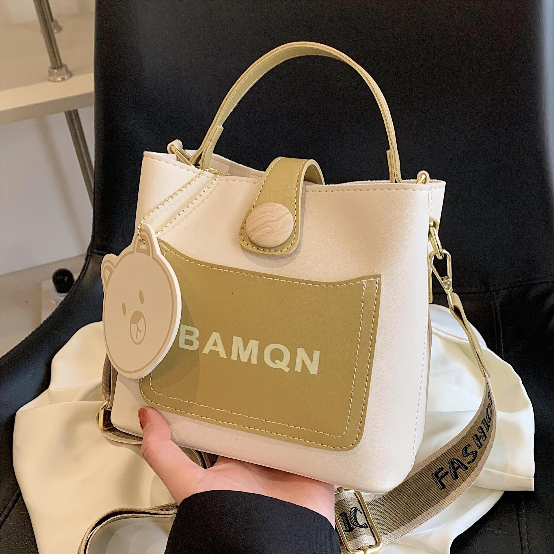 Diseño de nicho bolso a juego para mujeres 2023 nuevo popular bolsa de cubo bolsa de mensajero portátil de celebridades en línea de alta calidad