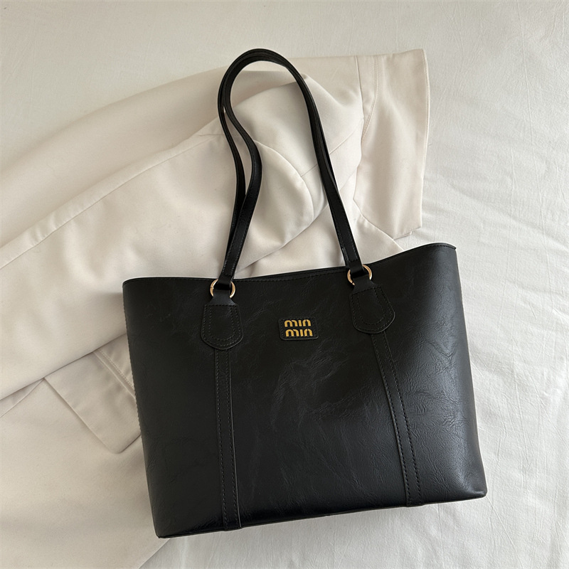 Bolsa de hombro de viaje retro de alto nivel, mujer, invierno 2024, nueva bolsa de mujer de trabajo, moda de bolsas Toto este año.