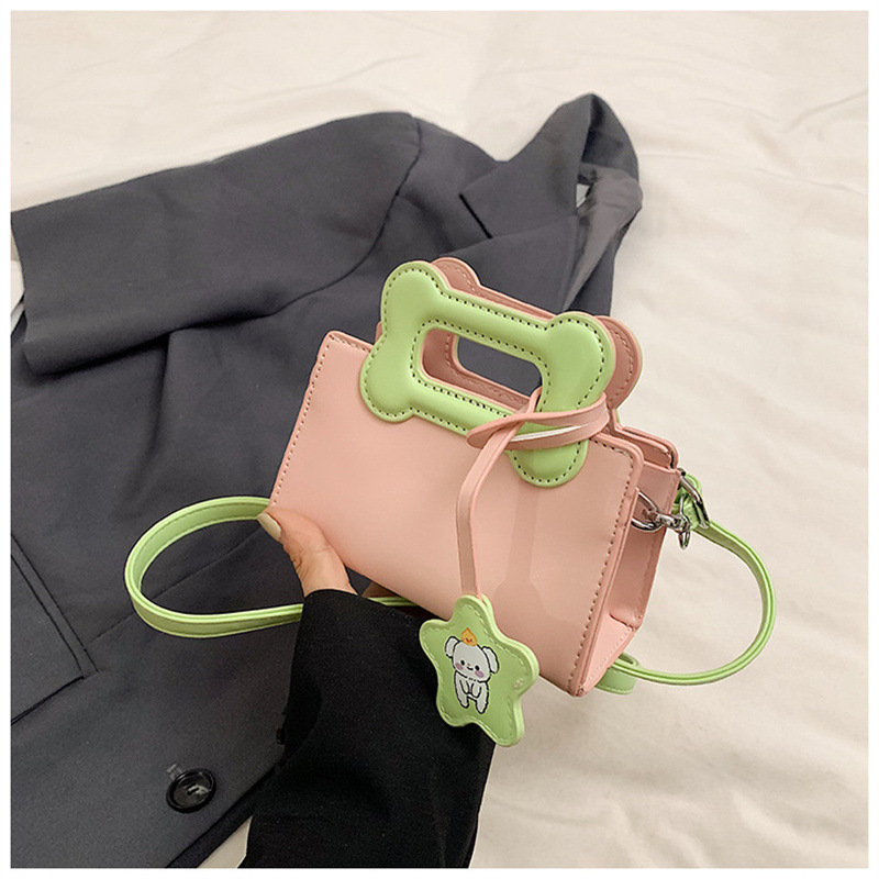 2025 primavera y verano estilo caliente moda casual niños dulces bolsa de gelatina mini bolso de mensajero de un solo hombro variedad al por mayor