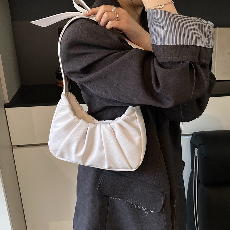 Bolso de axila popular de este año 2025 primavera y verano nuevo bolso femenino lindo bolso de lazo bolso de hombro plisado de moda