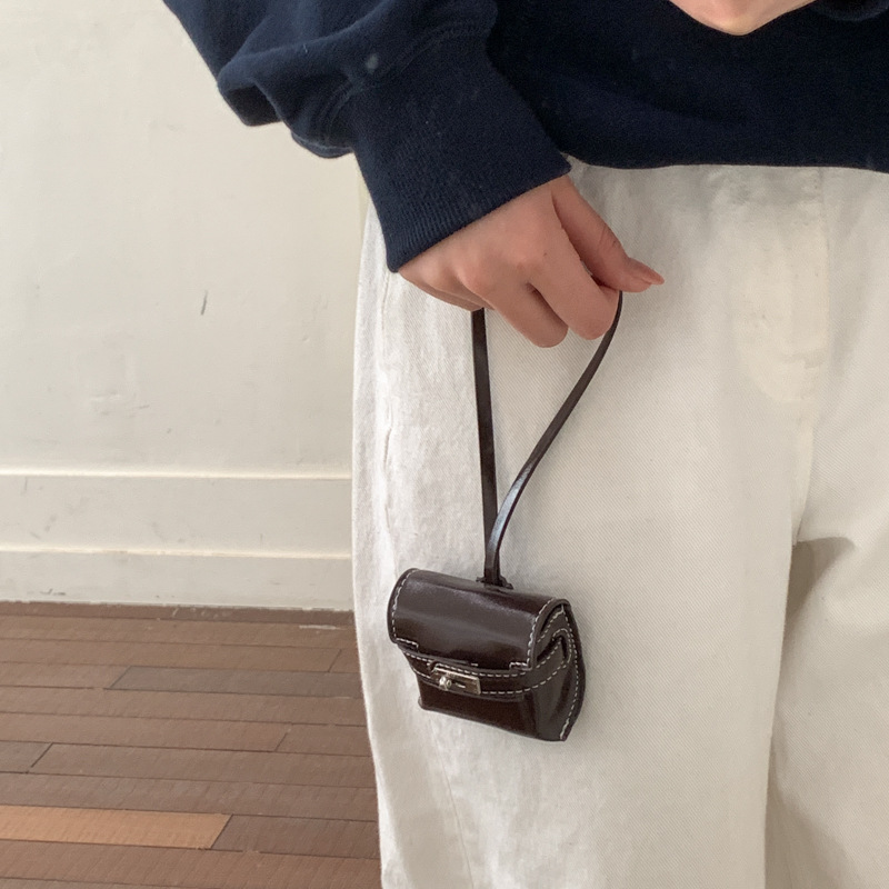 Mini bolso de mujer primavera / verano 2026 nueva personalidad creativa bolso diario bolso de moda bolso de lápiz labial bolso de moda colgante bolso de moda