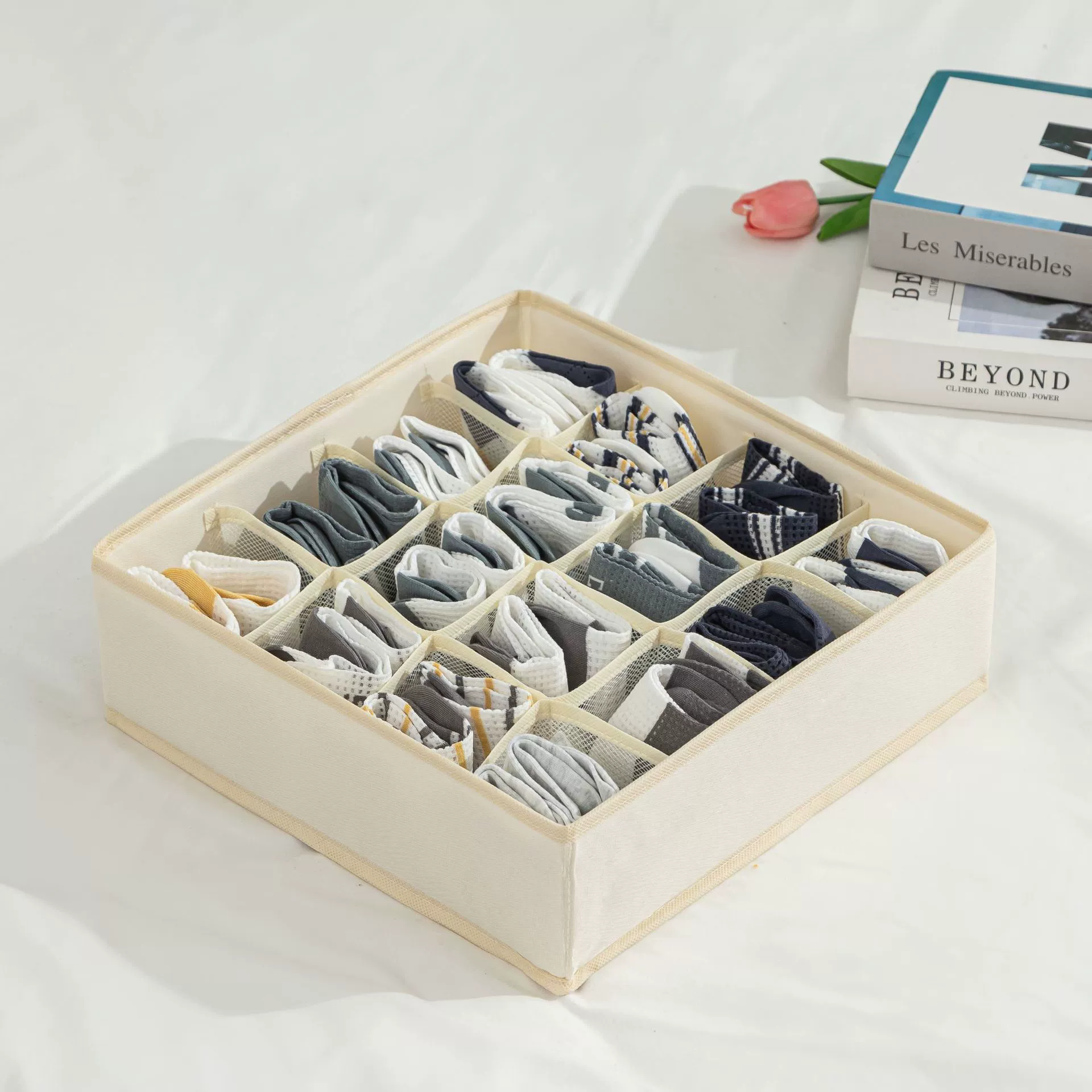 Storage system, underwear, tights, socks, foldable cloth, storage box