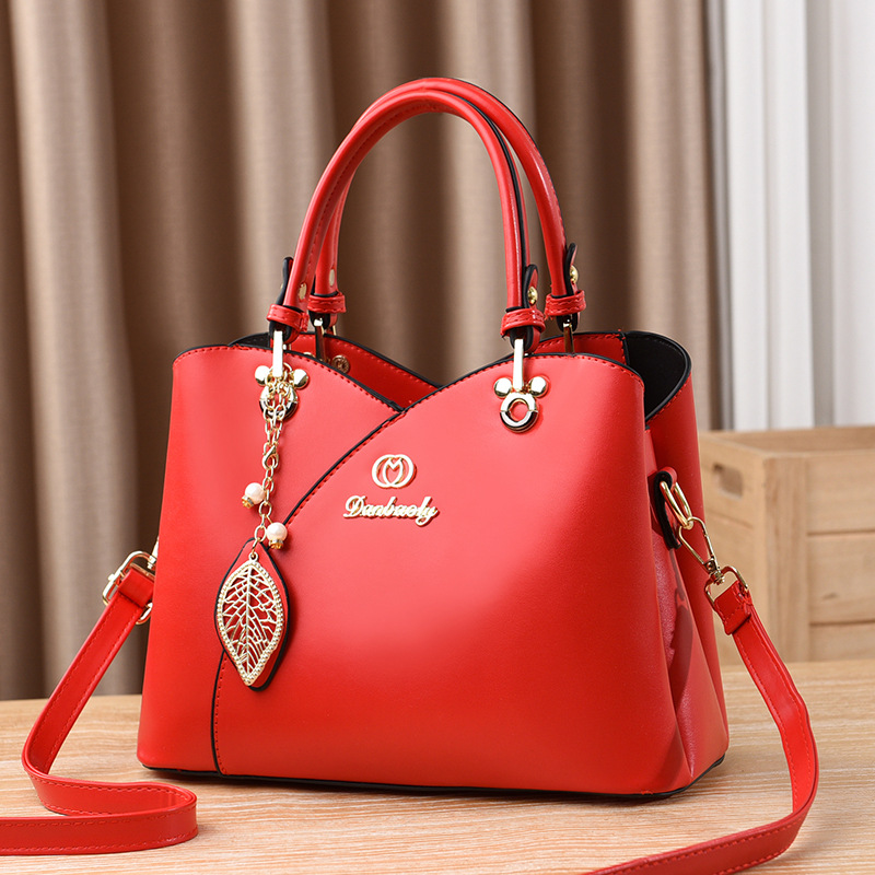 Bolso bandolera para mujer nuevo versátil bolso de mamá moda de verano bolso de mano de un solo hombro 2025 fabricante comercio exterior elegante para mujer.